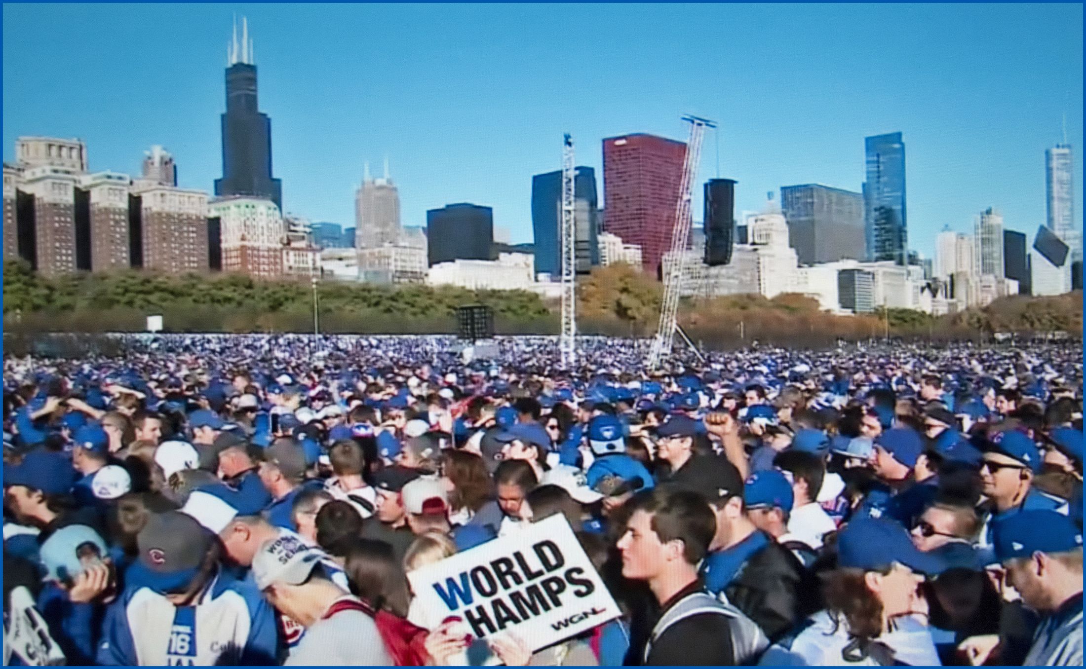 A huge crowd of fans celebrating a championship
