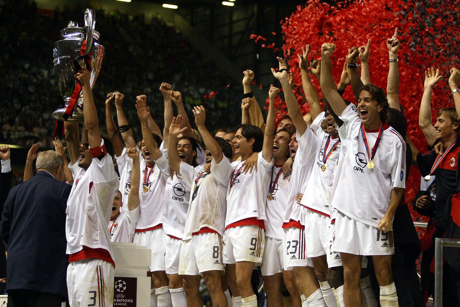 Players lifting a major soccer trophy